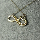 Colier din aur 14K cu simbol infinit, inimă și pietre decorative – 2,46 g