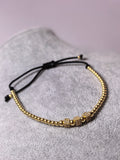 Brățară reglabilă cu șnur, bile din aur galben 14K și 3 zaruri pavé, 4,78 g