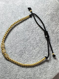 Brățară reglabilă cu șnur, bile din aur galben 14K și 3 zaruri pavé, 4,78 g